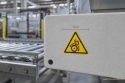 Naklejka BHP 15 cm - Ostrzeżenie przed promieniowaniem optycznym - W027